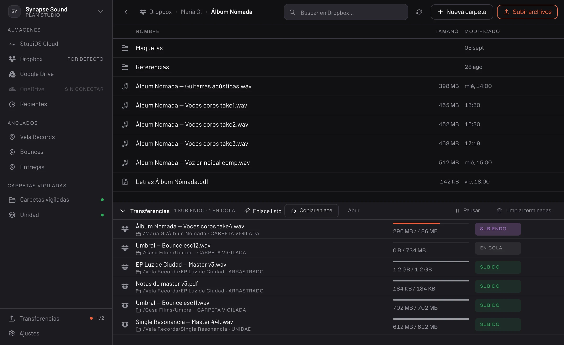Uploader — una carpeta de Dropbox con la cola de transferencias abierta